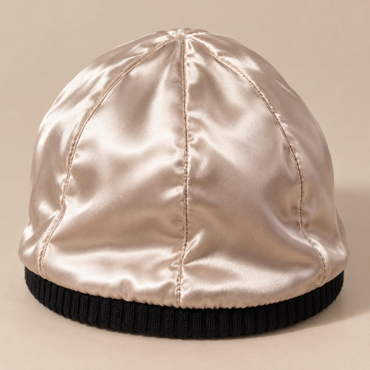 Black beanie turned inside out to show the satin lining